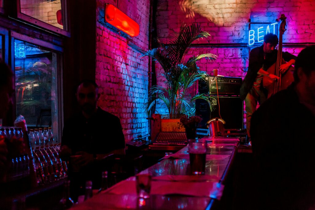 Neon-lit lounge or bar interior