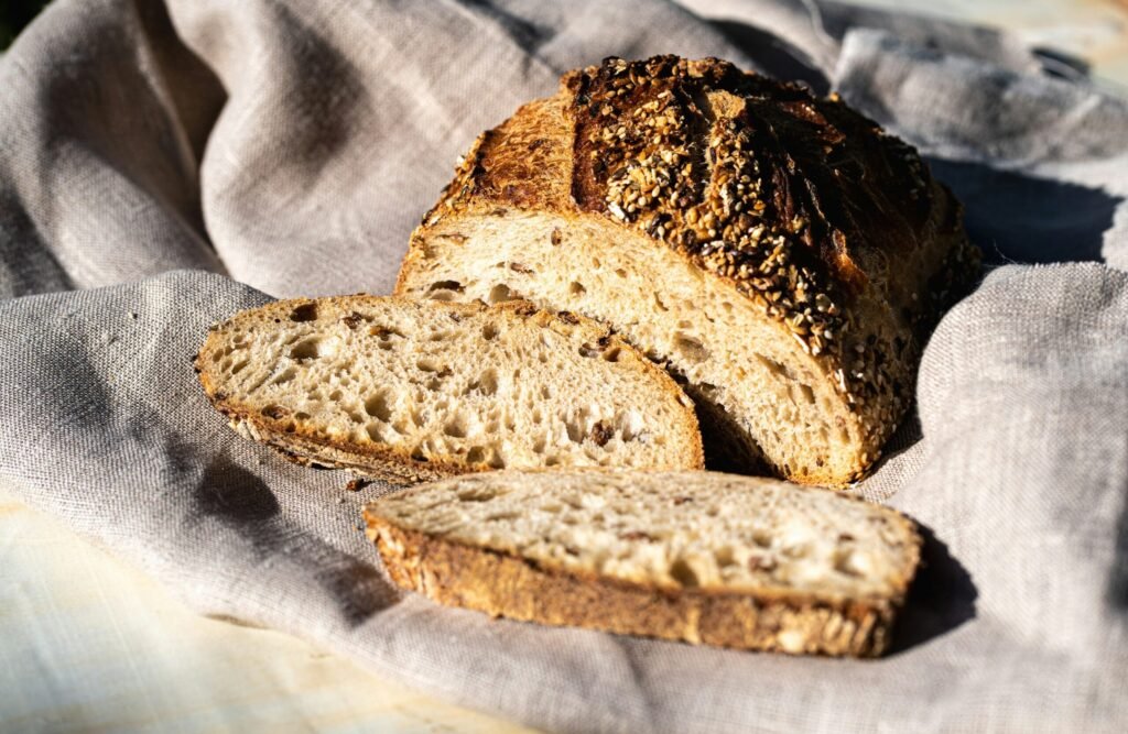 Sliced seeded bread on cloth